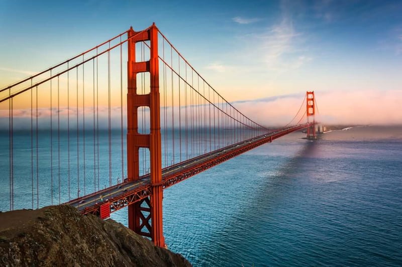 Sunset view of the Golden Gate Bridge and fog from Battery Spencer,  Golden Gate National Recreation Area, in San Francisco, California.-1